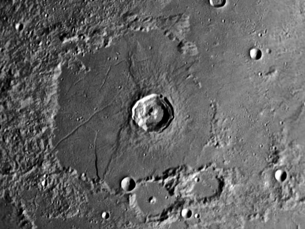 Bürg, a complex crater with terraces and a central mountain peak that appears to be split in two